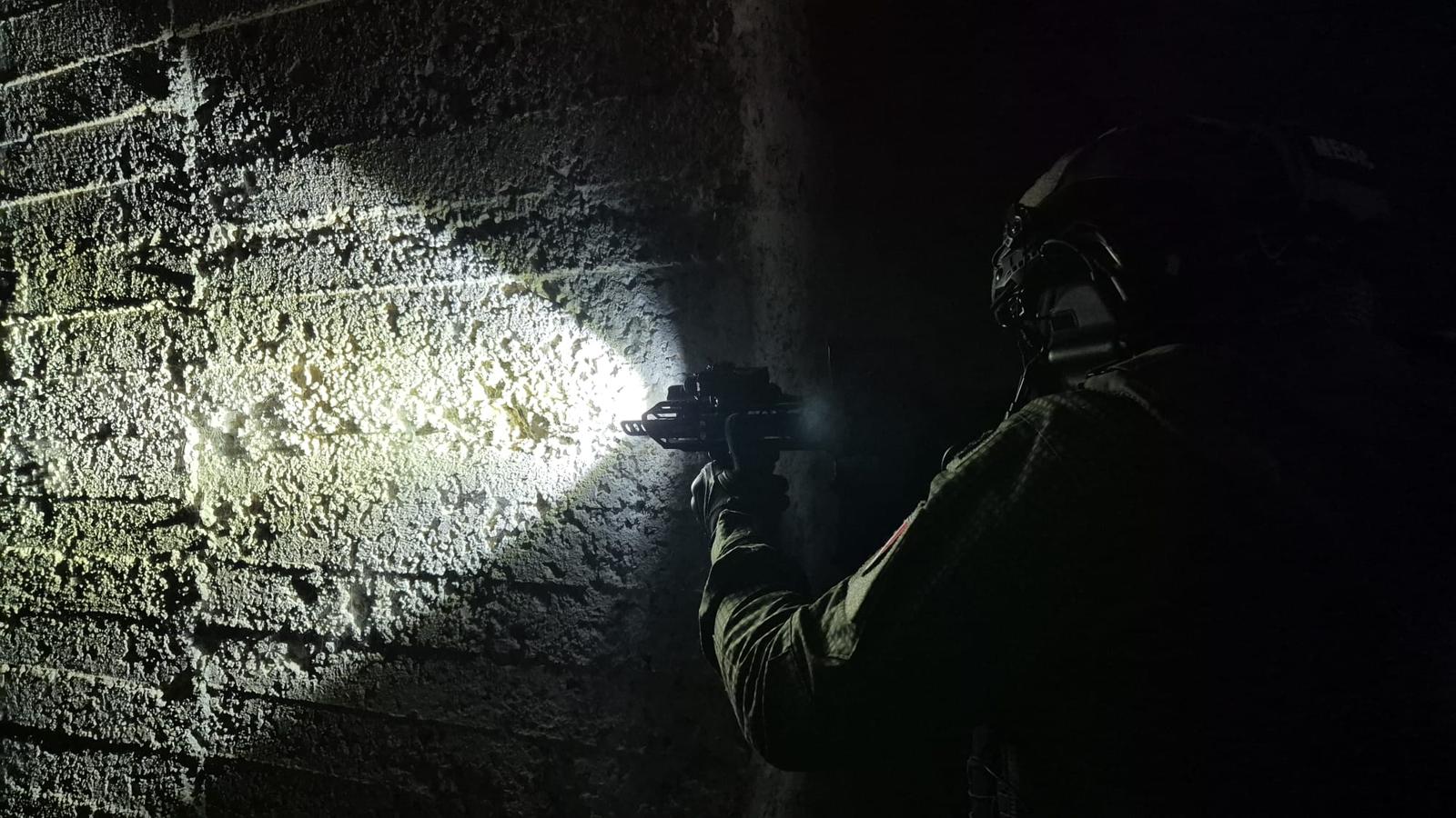 Operator using a Skywoods tactical light at night